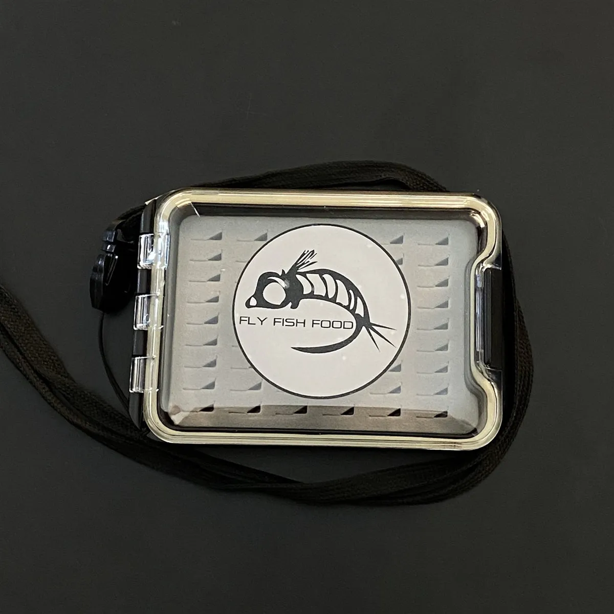 FLY FISH FOOD LOGO FLY BOX, CLEAR SINGLE SIDED - SMALL W/ LANYARD, EASY GRIP FOAM
